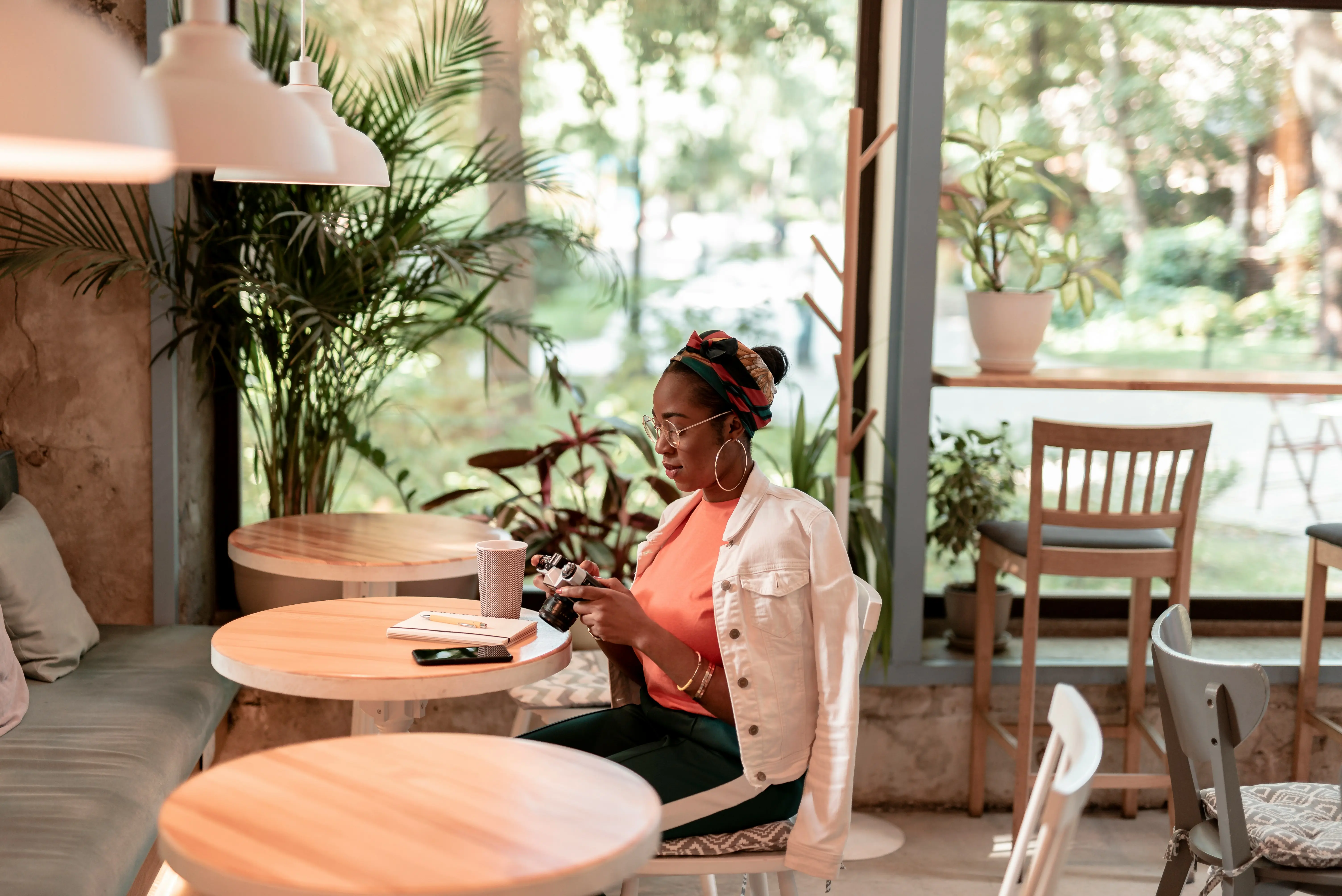 Woman at a cafe on her phone